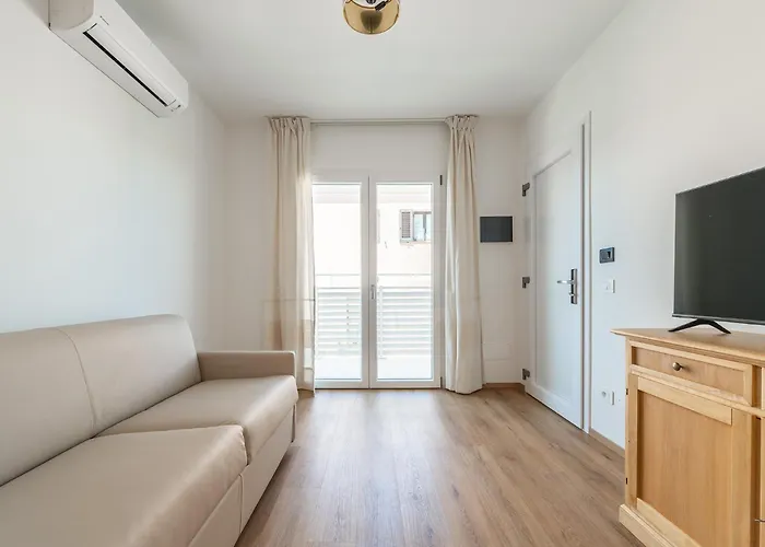 מלון דירות Olbia Rooms 3*